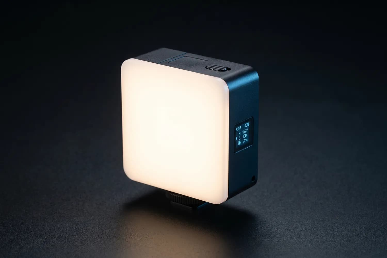 Ulanzi VL49 Pro pocket LED light glowing on a dark surface