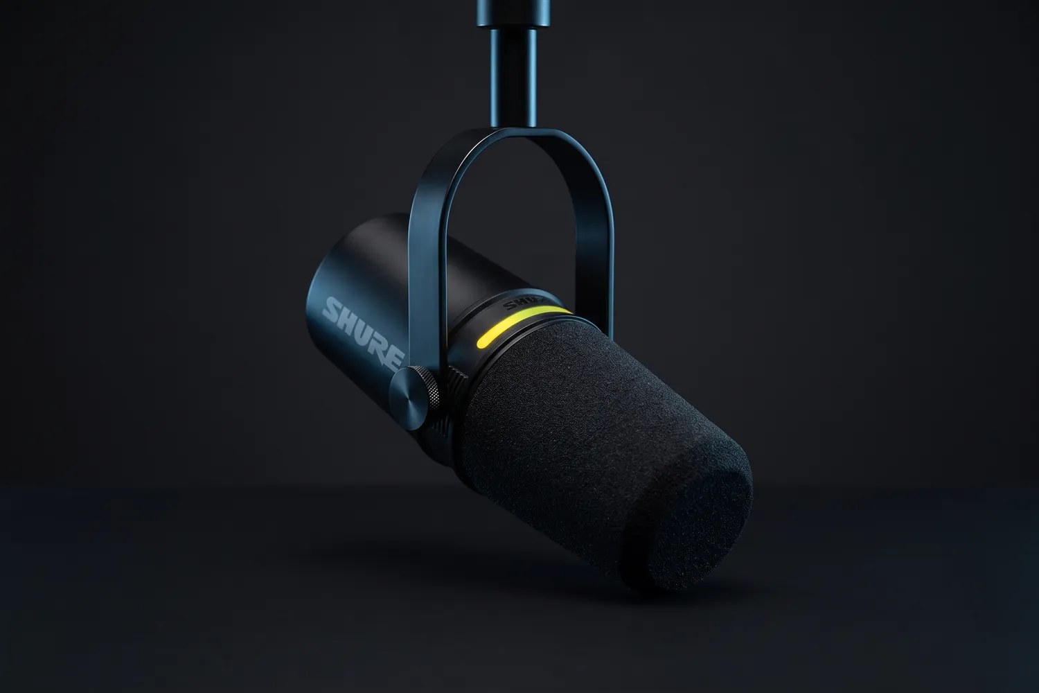 Shure MV7+ hanging from its yoke, the LED strip glowing