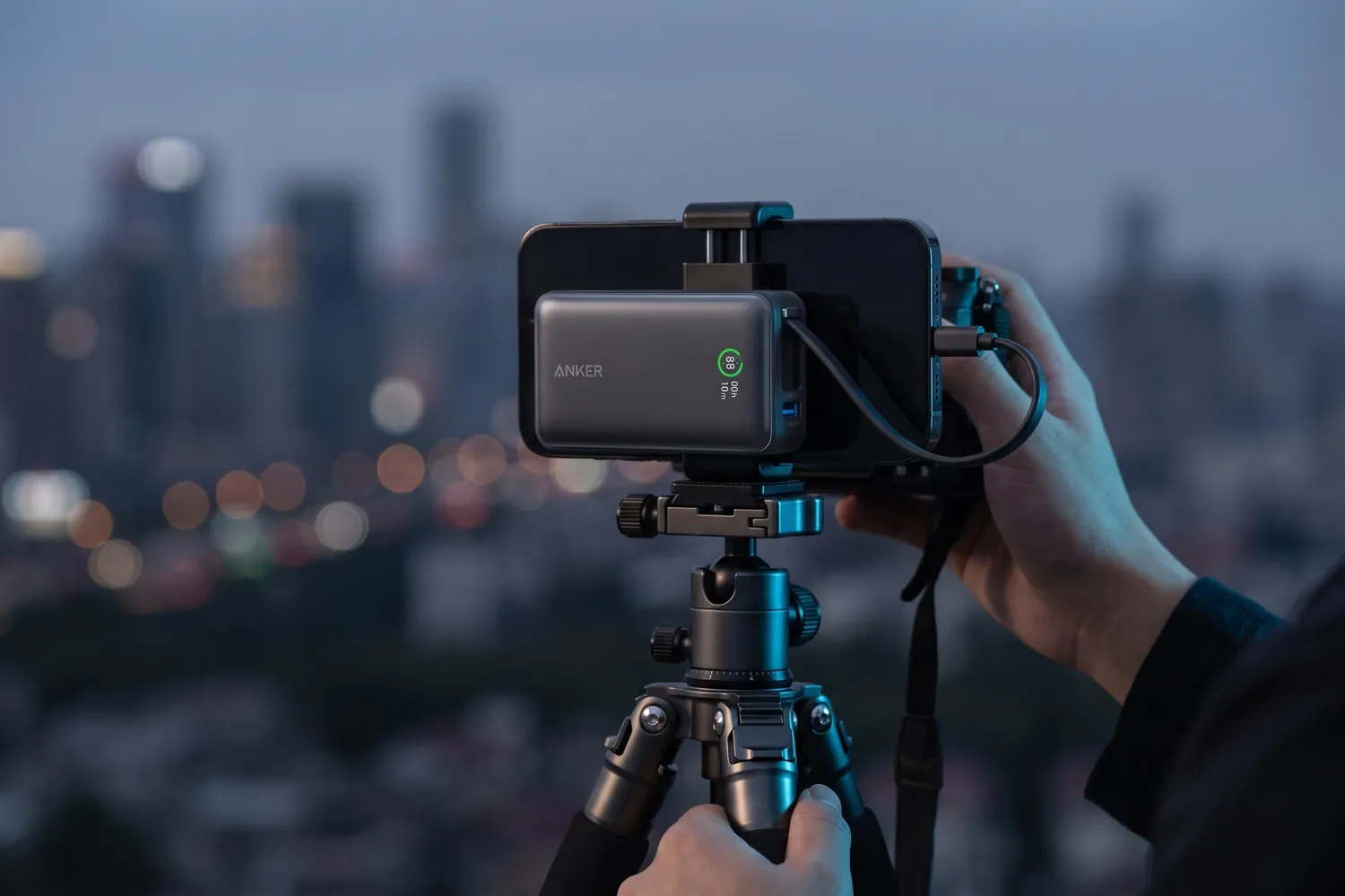 Anker Nano Power Bank charging a phone on a tripod during an outdoor shoot