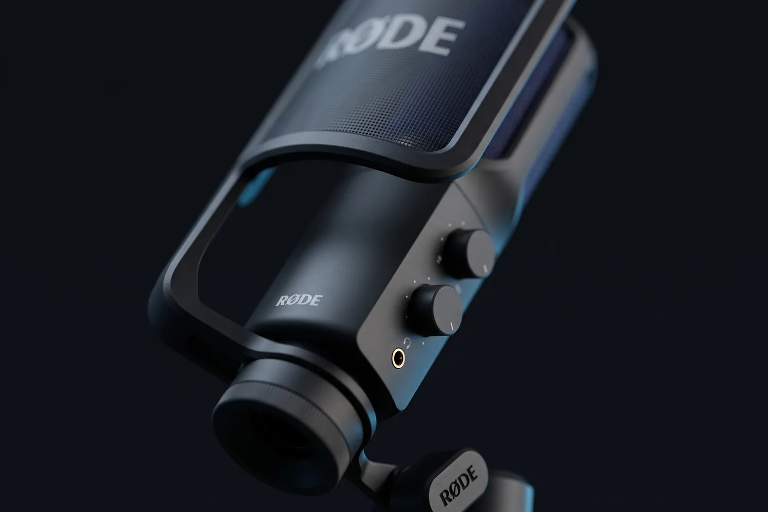 Close-up of the RØDE NT-USB+ control knobs and headphone jack