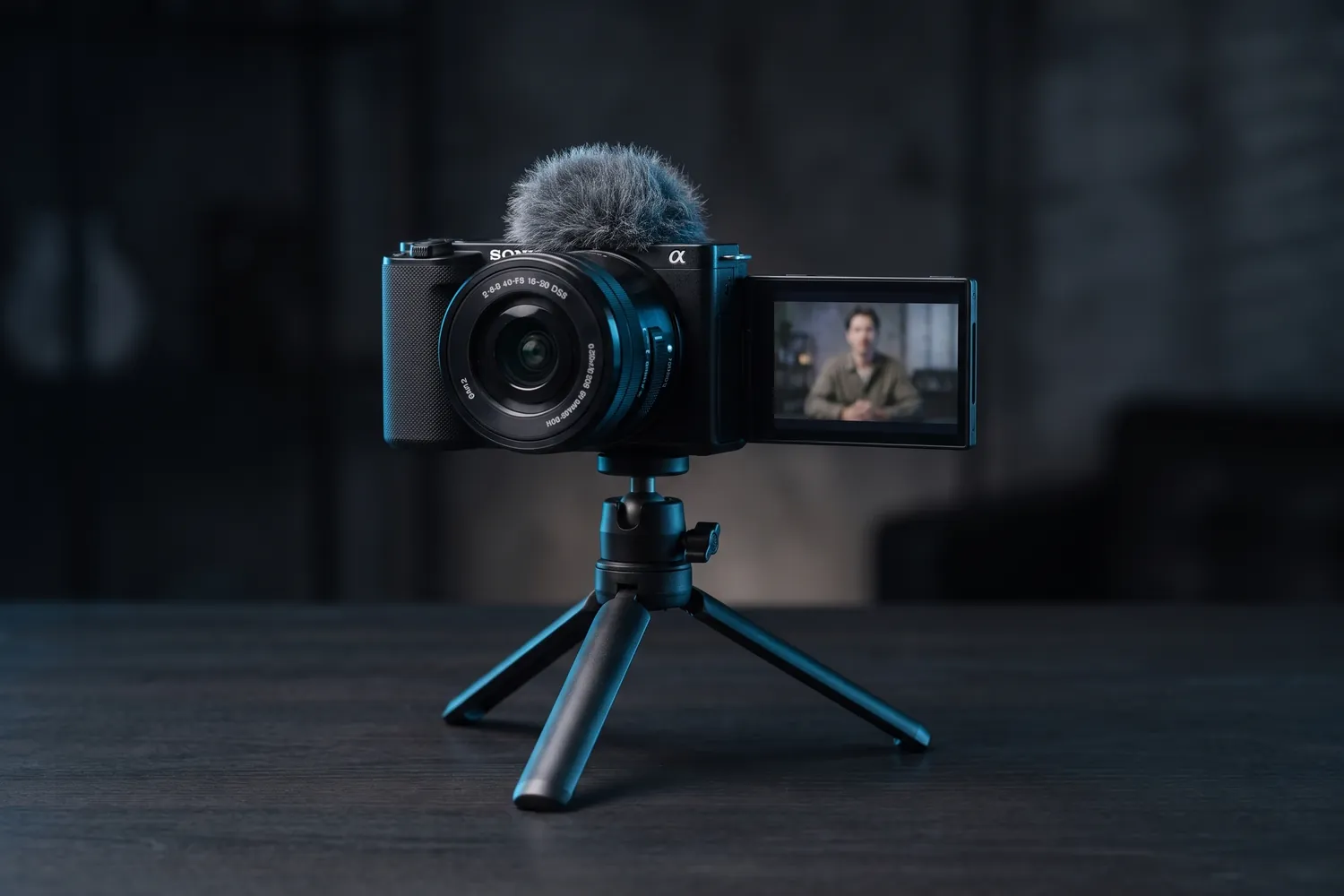 Sony ZV-E10 II on a small tripod filming a talking-head video
